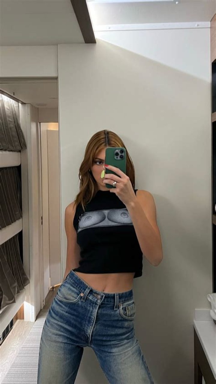 Kendall Jenner 'responds' to boob job accusations as she rocks NSFW crop top in sexy new selfie |