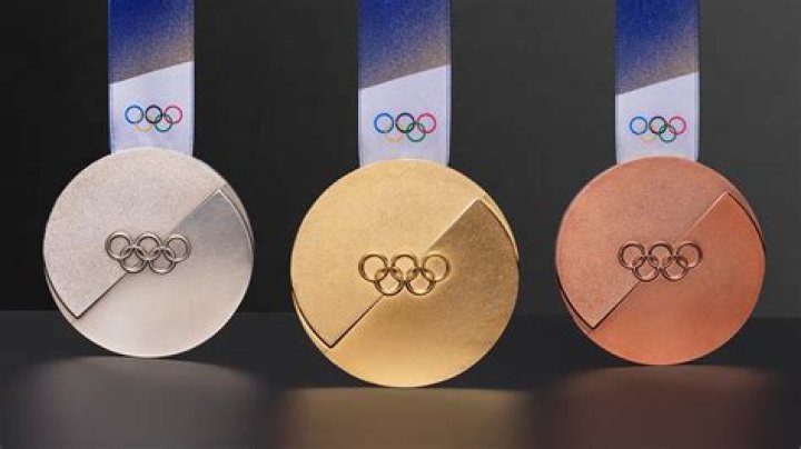 Uncover The Extraordinary Journey Of Amina Tyrone: Olympic Champion And Trailblazer